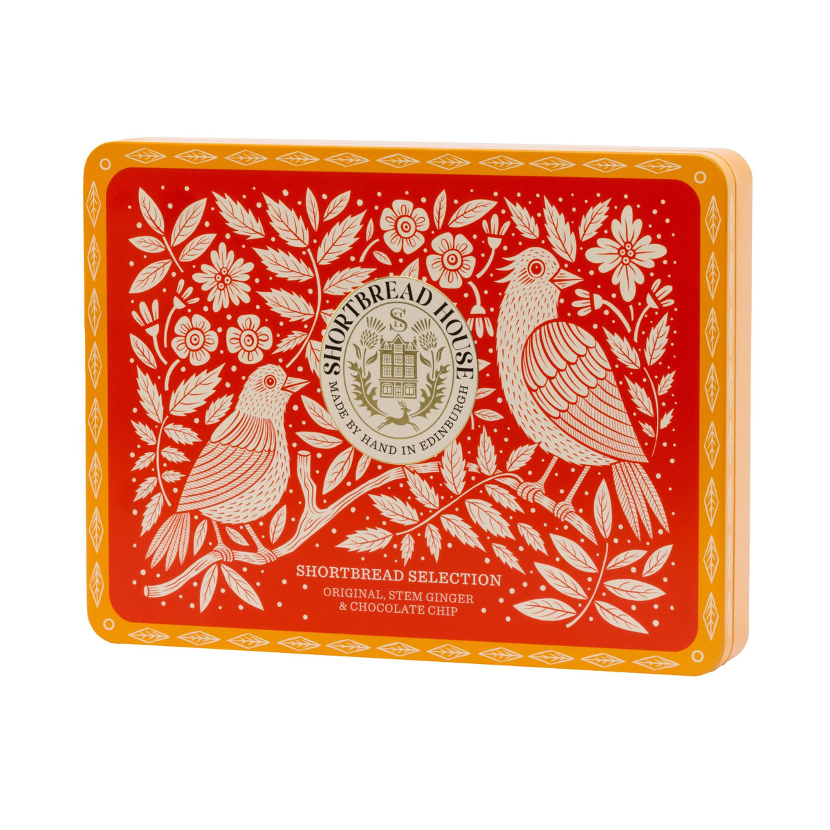 Decorative tin with bird and floral design on a red background