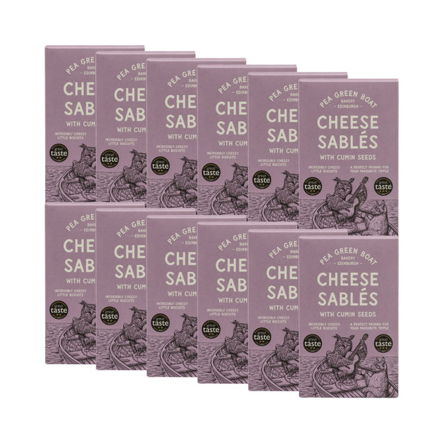 12 Purple boxes of Pea Green Boat Cheese Sablés. The packaging features an illustrated owl playing a guitar in a boat.