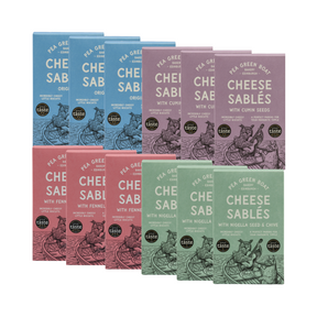 A collection of 12 boxes of Pea Green Boat Cheese Sablés in the 4 flavours and colours. There is 3 boxes of each flavour. 