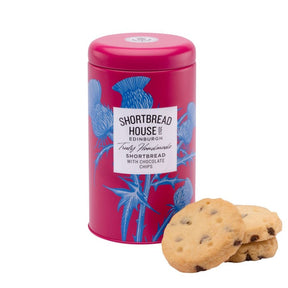 Pink tin of Shortbread House of Edinburgh shortbread with chocolate chips, accompanied by biscuits on a white background.