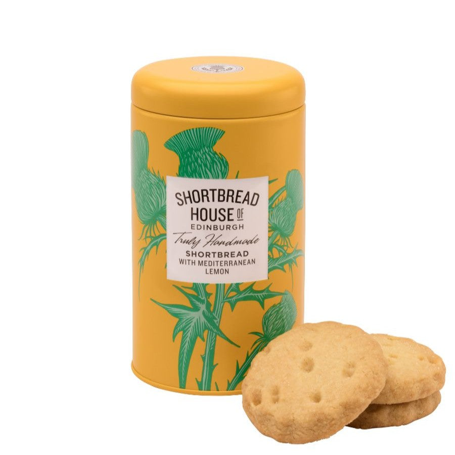 Yellow tin of Shortbread House of Edinburgh shortbread cookies with green thistle design.