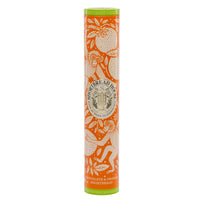 Orange and green shortbread tin with illustrations of monkeys and oranges.