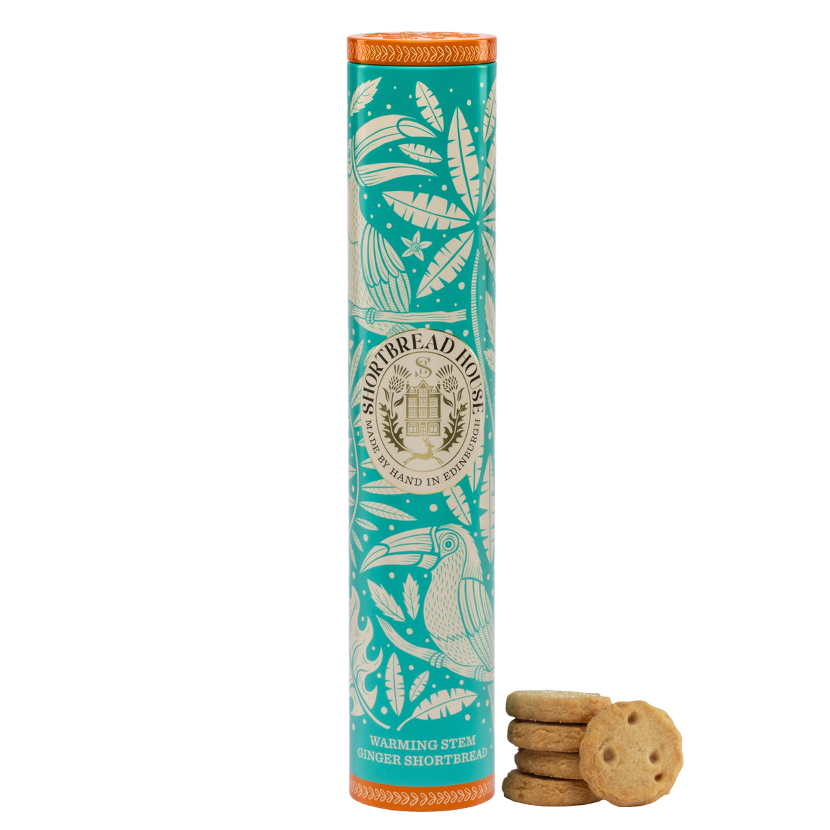 Teal and orange tin with illustrations of flowers and toucans next to ginger shortbread biscuits.