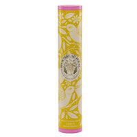 Lemon shortbread in a yellow tin with illustrations of hummingbirds and flowers.