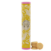 Lemon shortbread in a yellow tins illustrated with hummingbirds and flowers with biscuits in front.